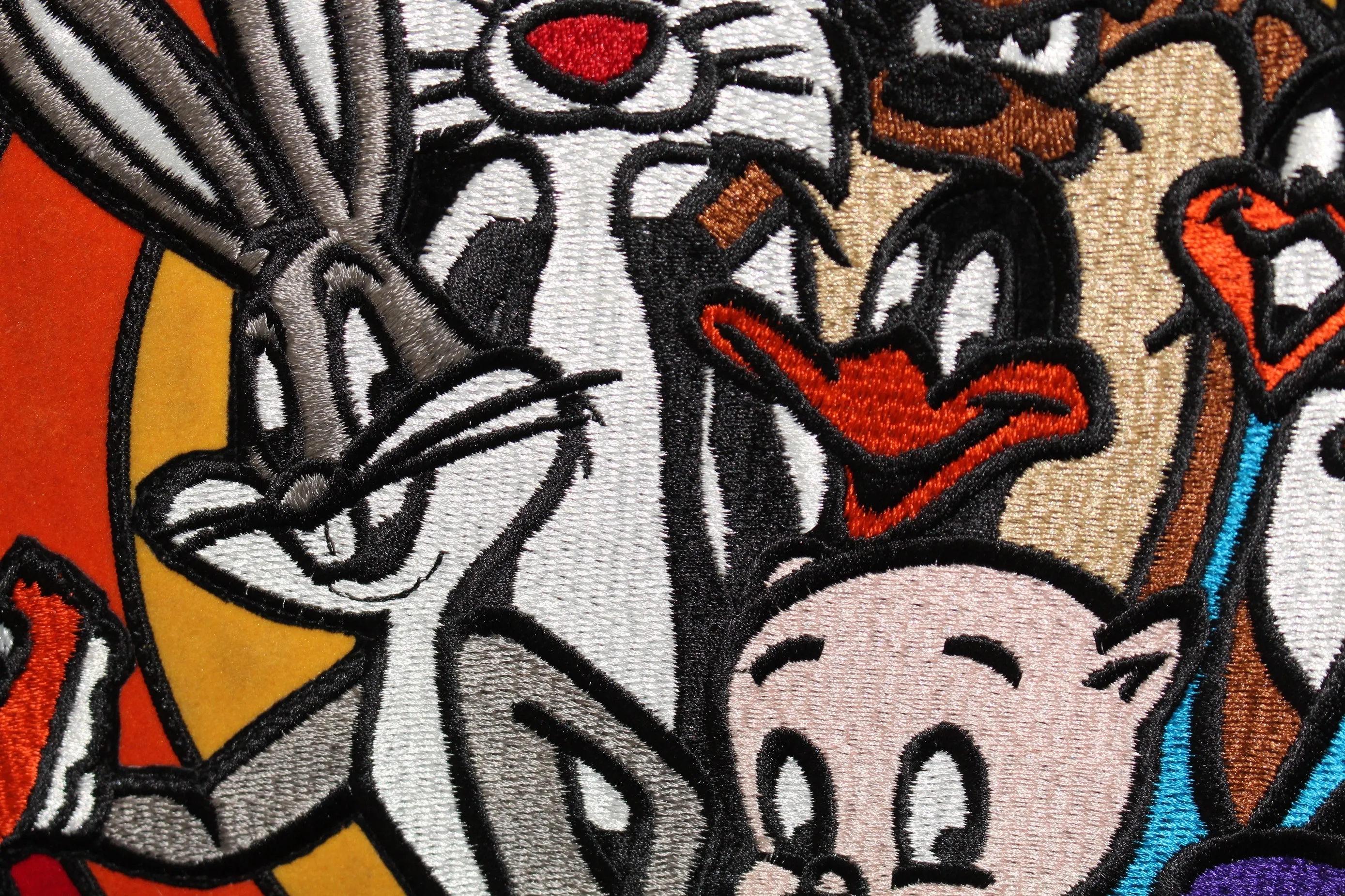 Here’s an optimized title for your e-commerce product:

Looney Tunes Vintage Leather Jacket by Jeff Hamilton - Size Large

This title includes key details that will attract potential buyers while being clear and descriptive.